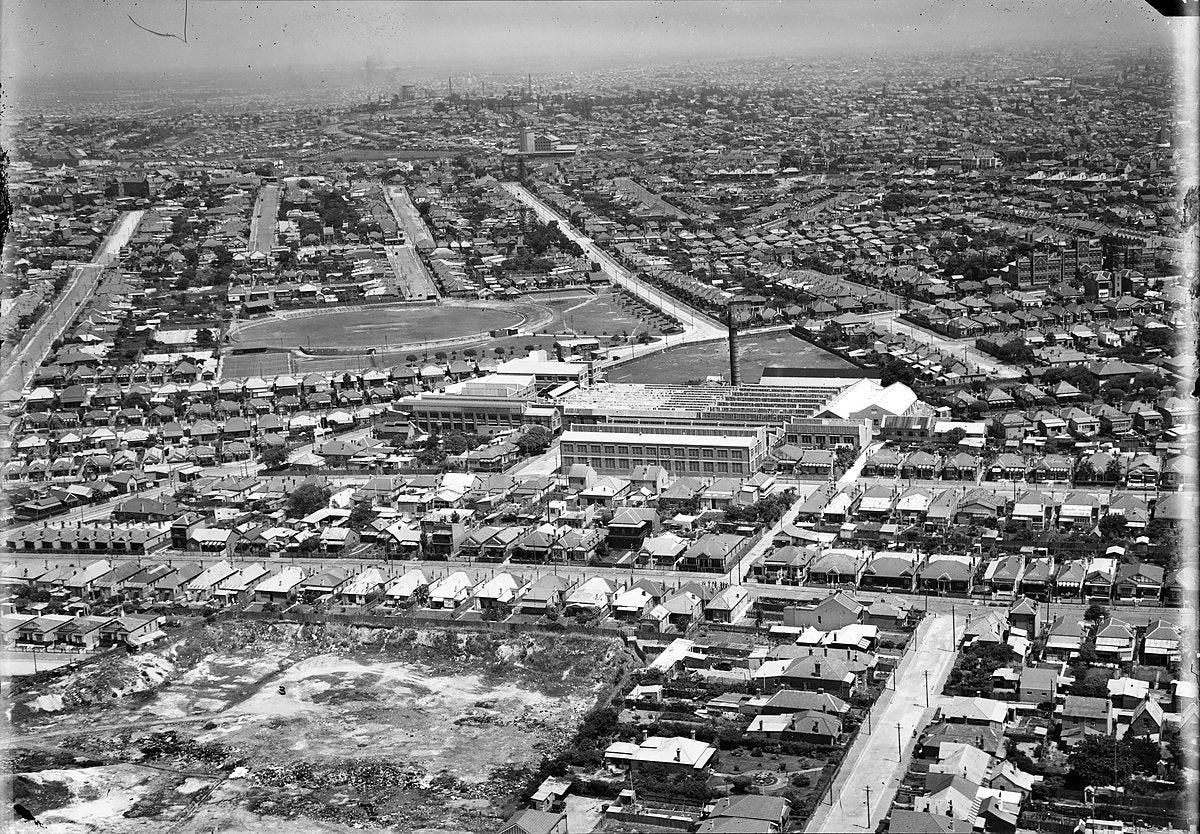 Aerial view of a Sydney factory complex and suburban streets — photograph, 1930s
