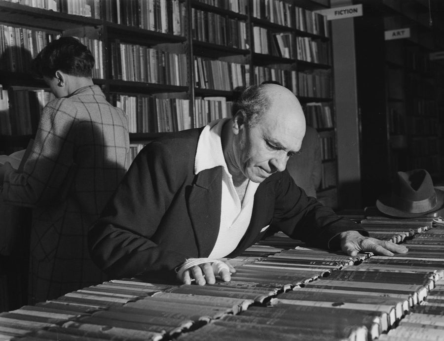 Browsing the second-hand book tables, Marrickville — photograph, from Marrickville, circa 1949