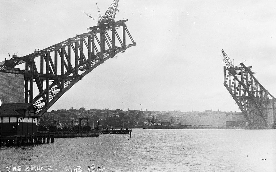 Unjoined arches of the Sydney Harbour Bridge, 1930 — photograph, from Olympic Drive, circa 1930