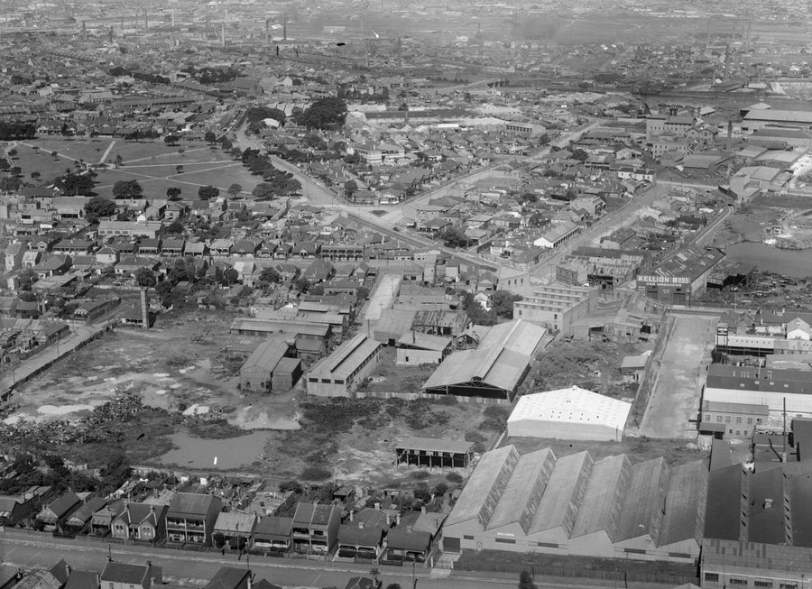 Aerial view over Marrickville rooftops and factories — photograph, from Marrickville, circa 1935