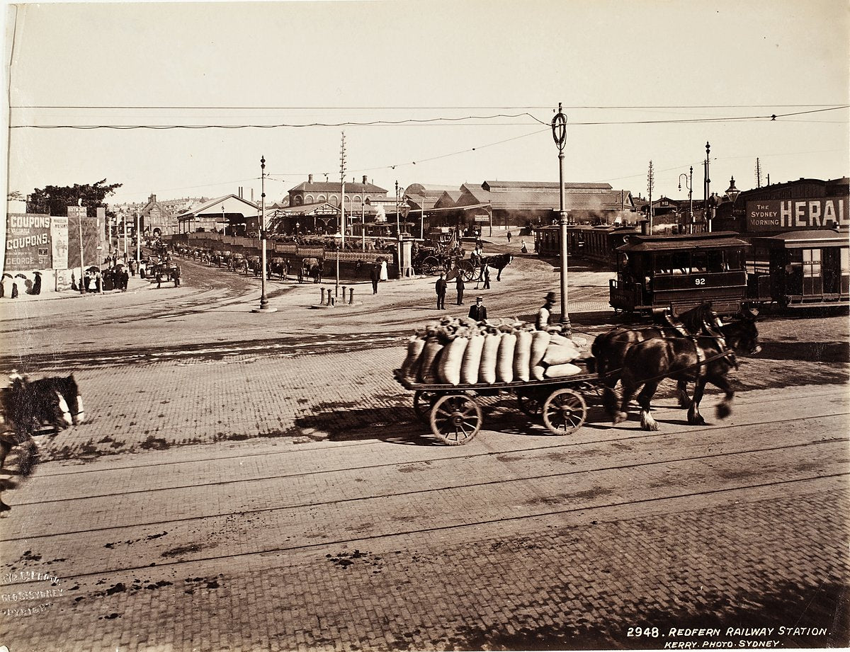 Horse-drawn wagon outside Redfern Railway Station, Sydney — photograph, from Randle Street, circa 1871