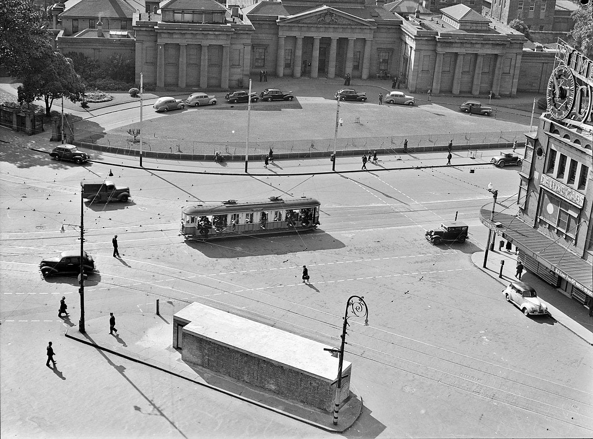 Tram crossing Taylor Square below Darlinghurst Courthouse, 1941 — photograph, from Taylor Square, circa 1941