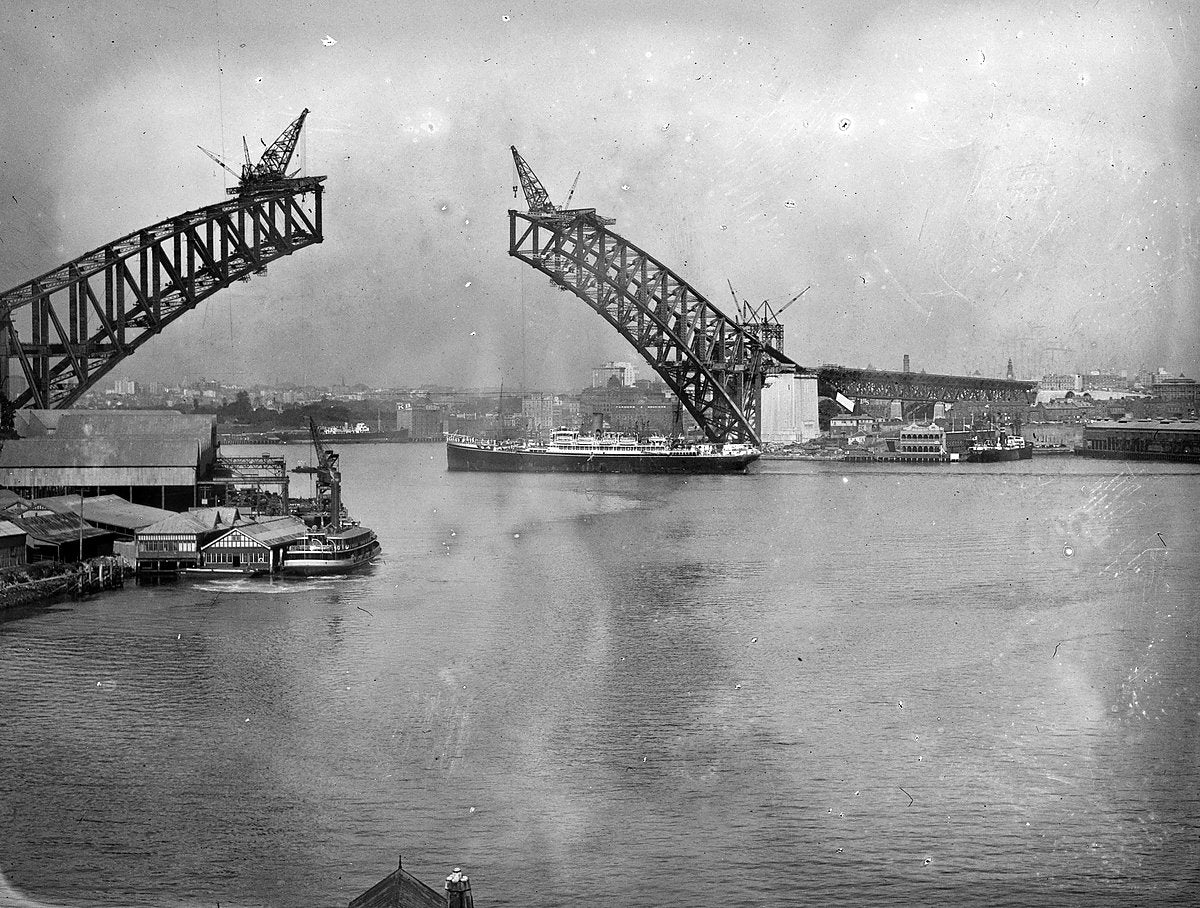 Sydney Harbour Bridge arch arms before joining, 1930 — photograph, from Sydney Harbour Bridge, circa 1930