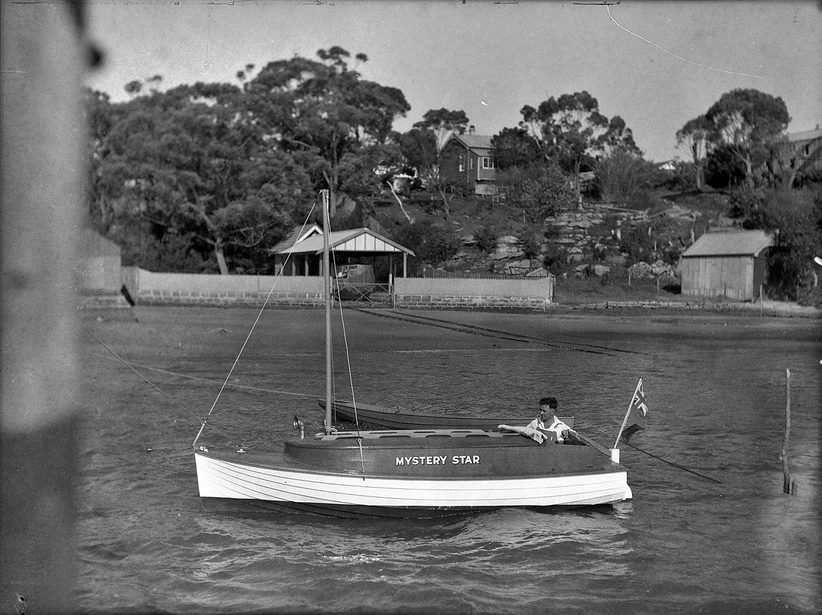 'Mystery Star' launch with a man at the helm — photograph, 1936