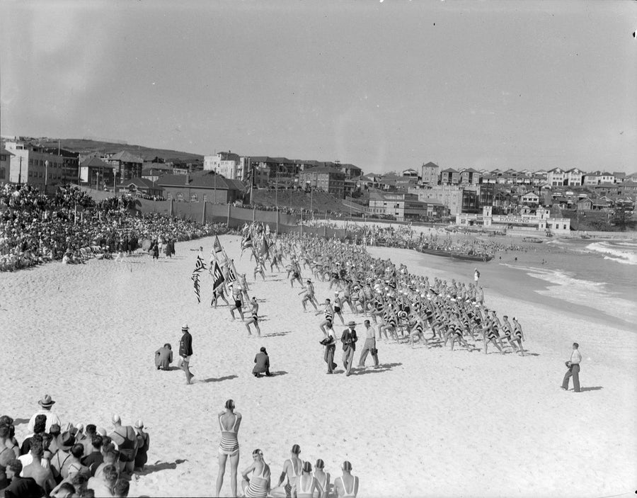 Surf lifesavers on parade, Bondi Beach surf carnival — photograph, from Bondi Beach, circa 1938