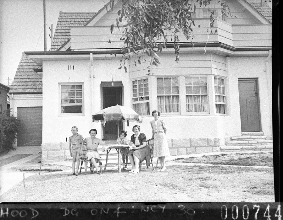 Family outside a bay-windowed home, North Sydney, 1940 — photograph, from North Sydney, New South Wales, circa 1940