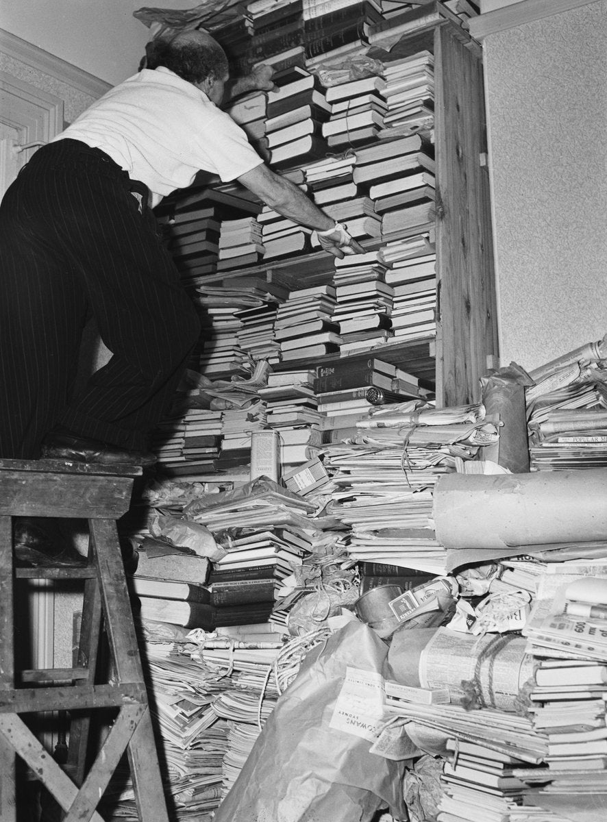 Book collector on a stepladder, Marrickville — photograph, from Marrickville, circa 1949