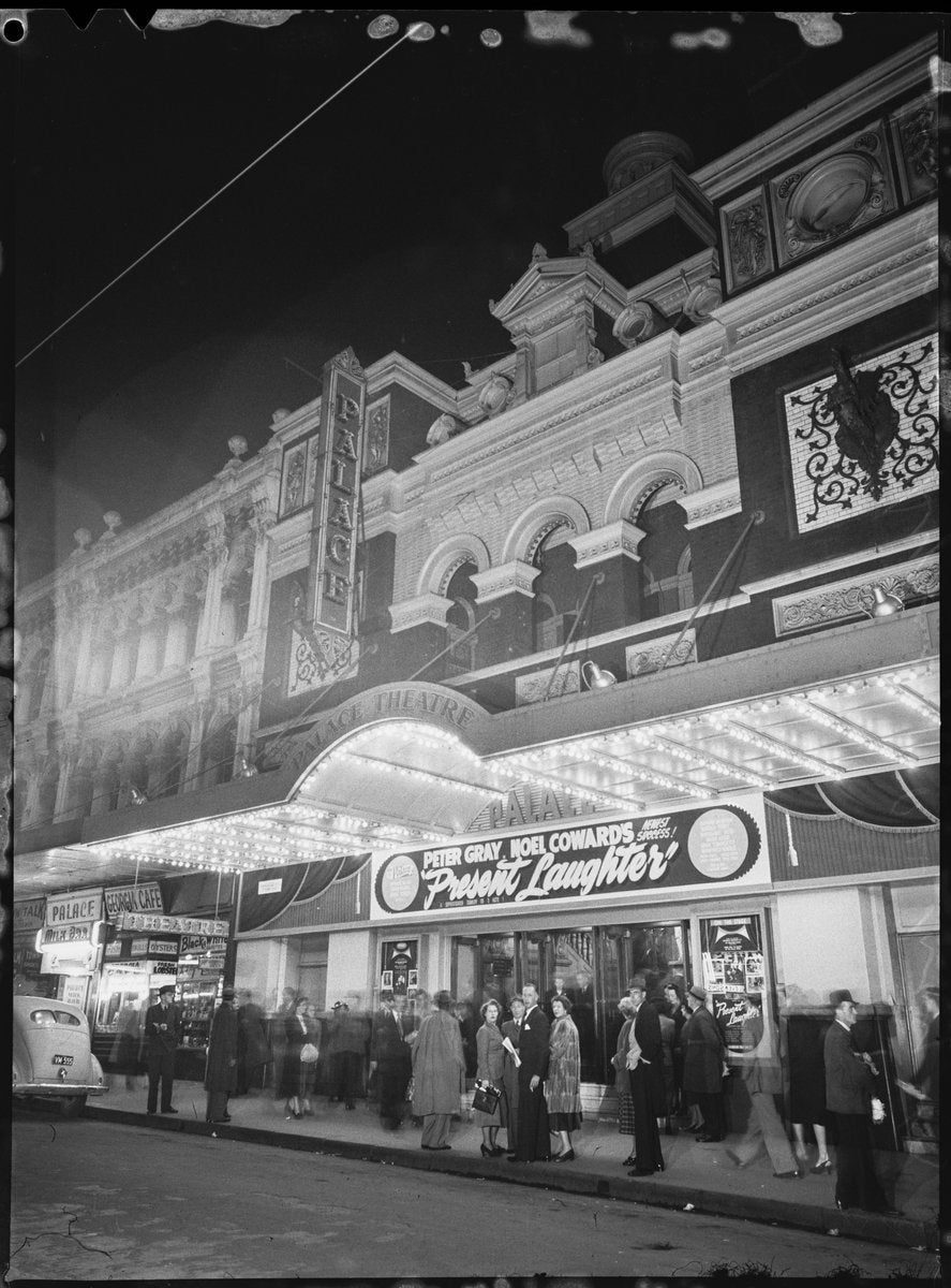 Palace Theatre, Pitt Street, lit at night for Noel Coward's "Present Laughter", 1949 — photograph, from Palace Theatre, 259–261 Pitt Street, Sydney, circa 1949