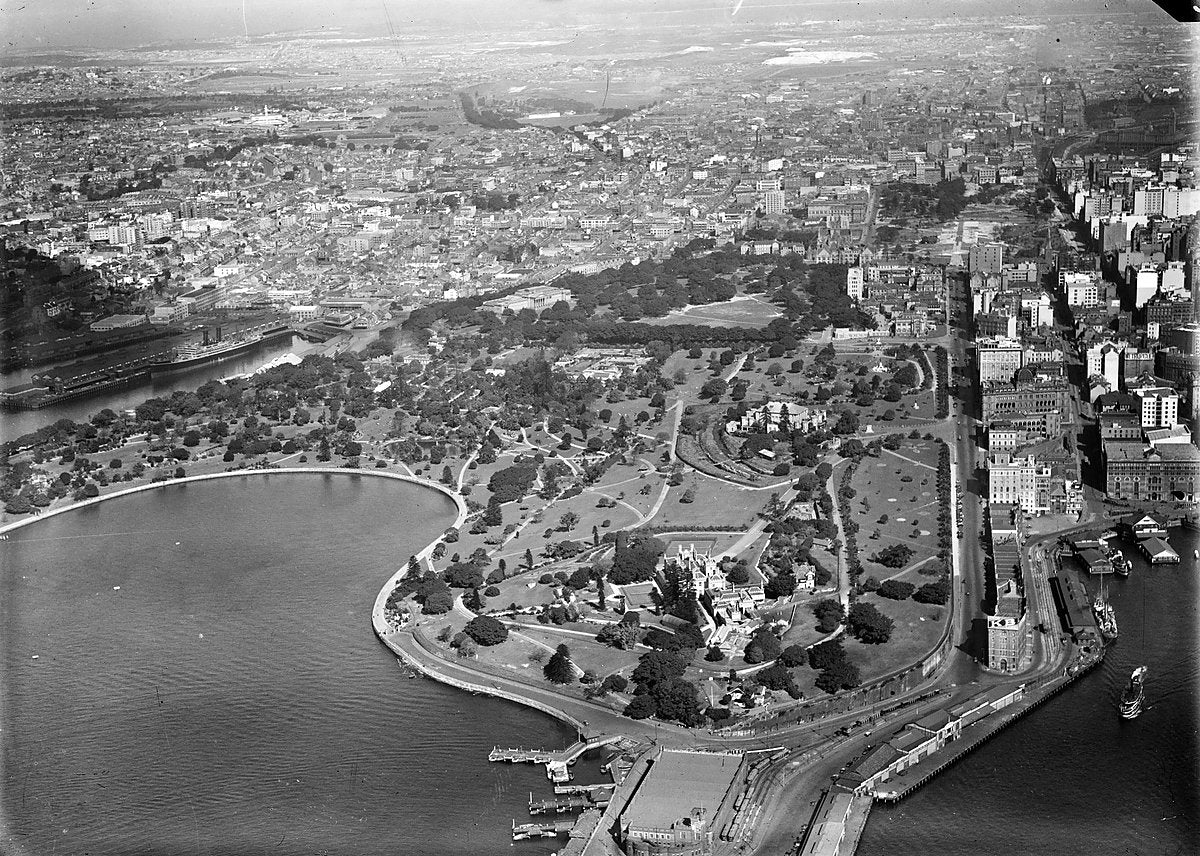 Fort Macquarie Tram Depot on Bennelong Point, Sydney, from the air — photograph, from Bennelong Point / Dubbagullee, c. 1920–38