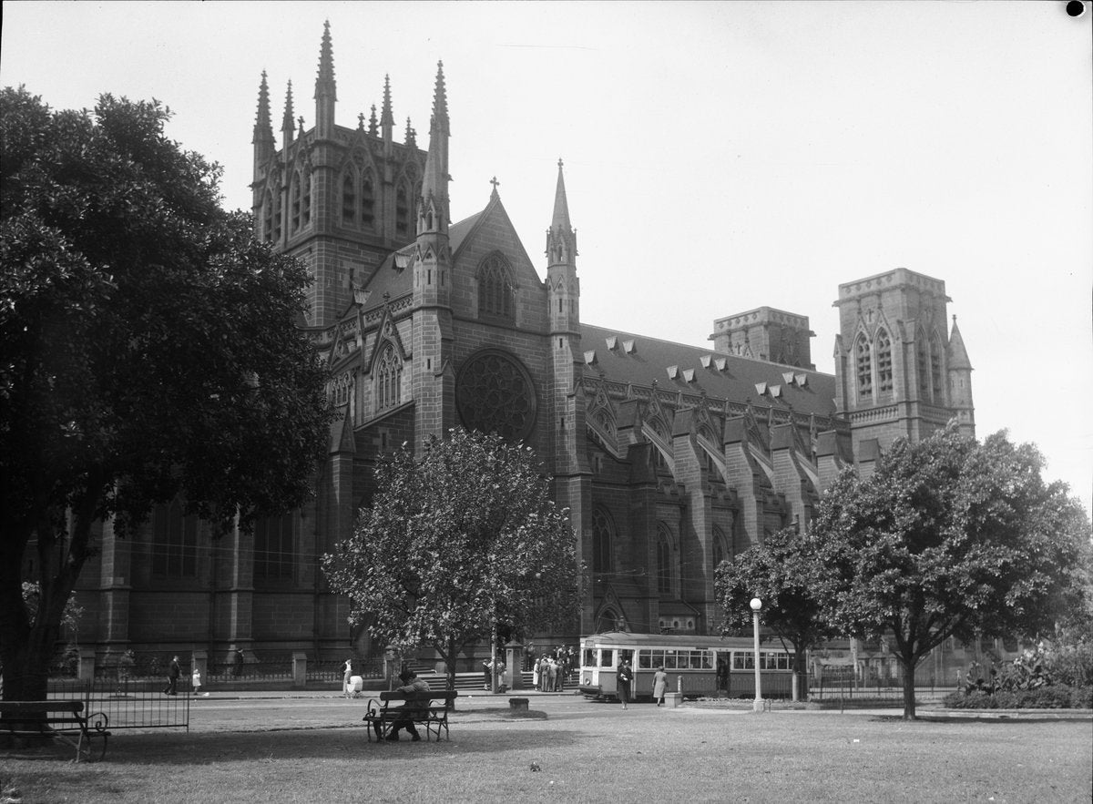 Tram passing St Mary's Cathedral, Sydney — photograph, from St Mary's Cathedral, circa 1940