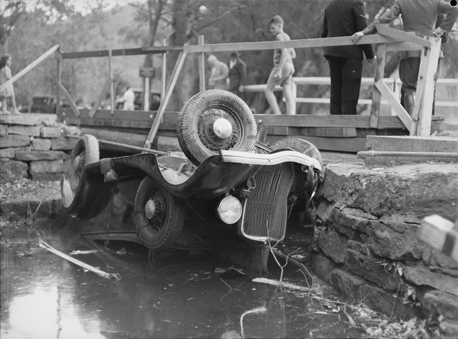 Overturned car after the Spit Road tram smash, Mosman, 1940 — photograph, from Spit Road, circa 1940