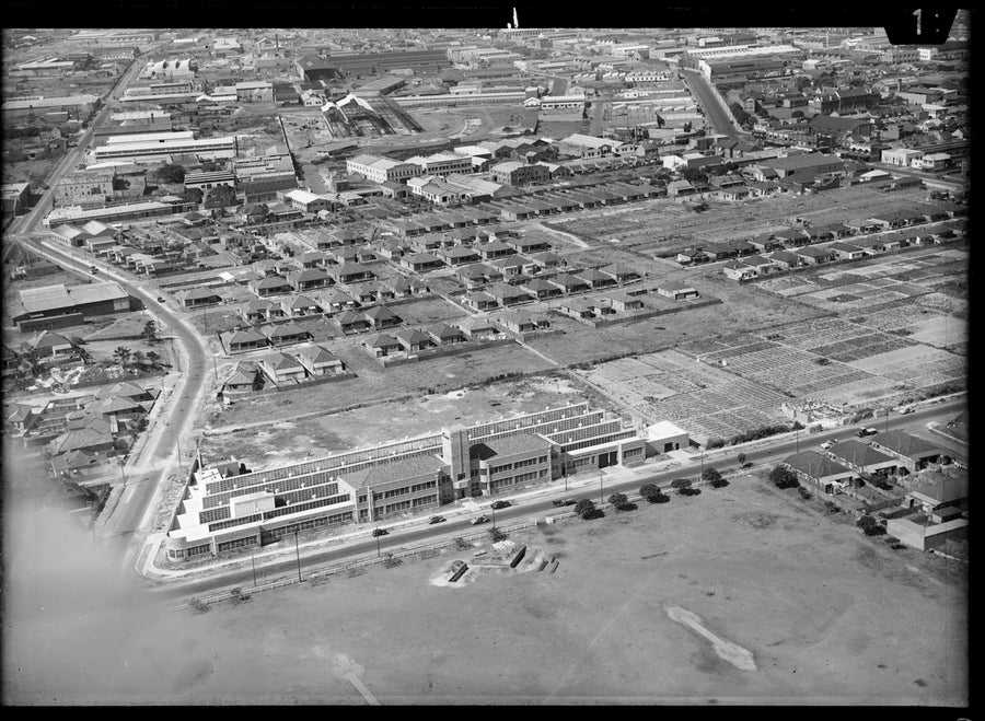 Aerial view over a factory and market gardens, Mascot, 1940s — photograph, from Mascot, New South Wales, circa 1940