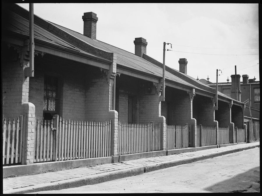 Row of single-storey brick cottages, Erskineville, 1938 — photograph, from Erskineville, circa 1938
