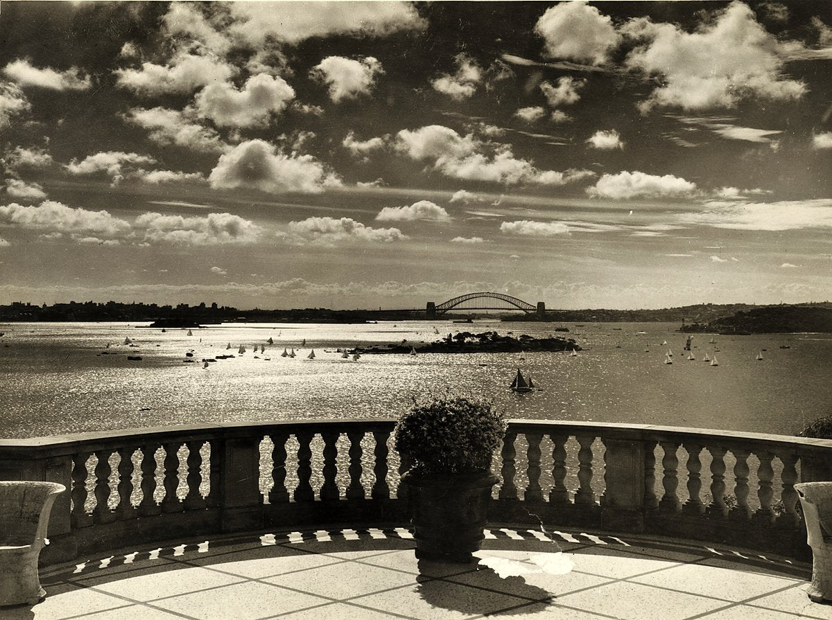 Sydney Harbour Bridge across Port Jackson from a garden terrace — photograph, from Sydney, c. 1932–50