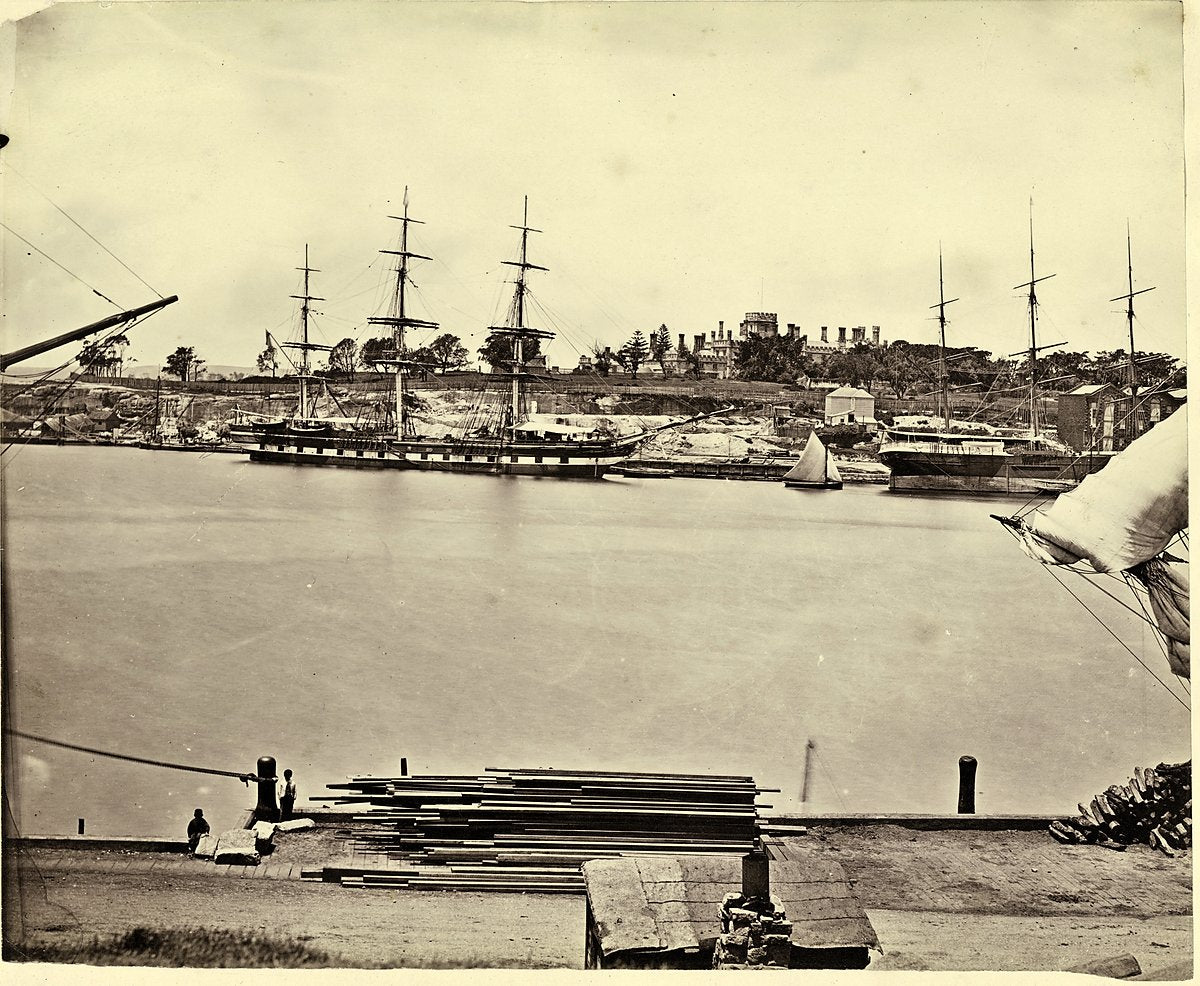 Sailing ships berthed at East Circular Quay with Government House beyond — photograph, from Sydney CBD, 1870