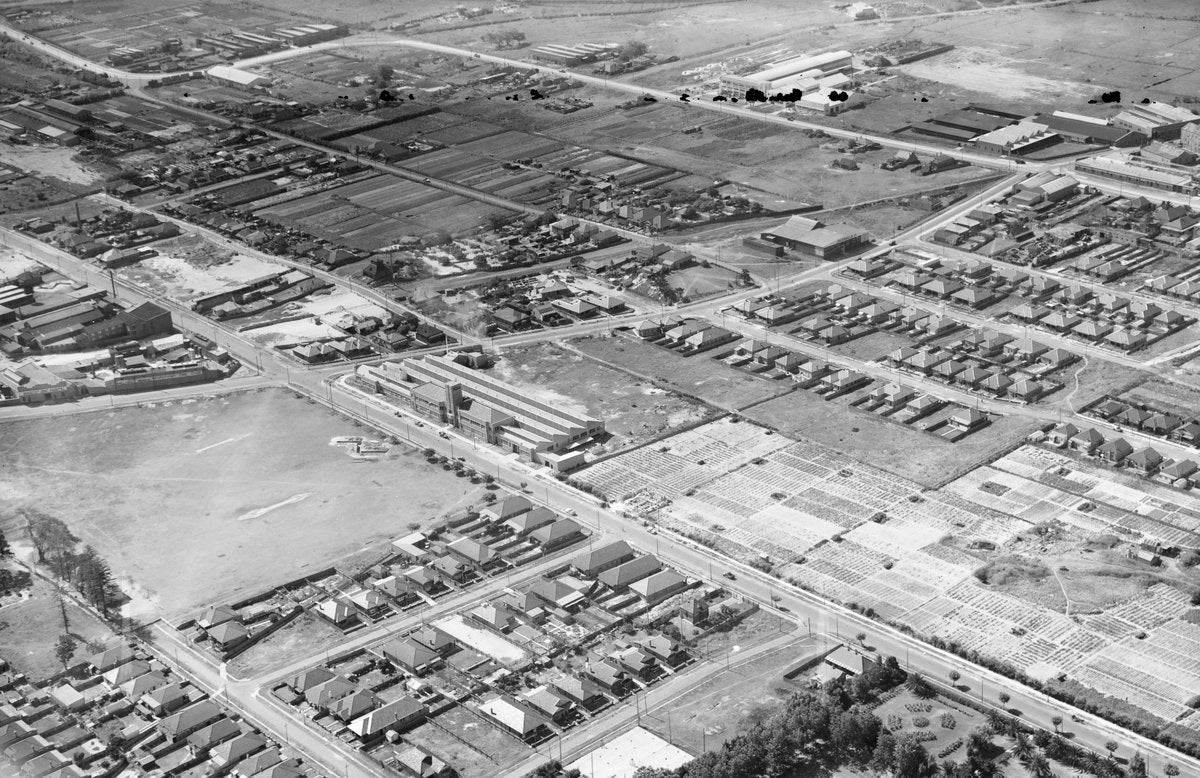 Aerial view over market gardens, factories and housing, Mascot — photograph, from Mascot, circa 1940