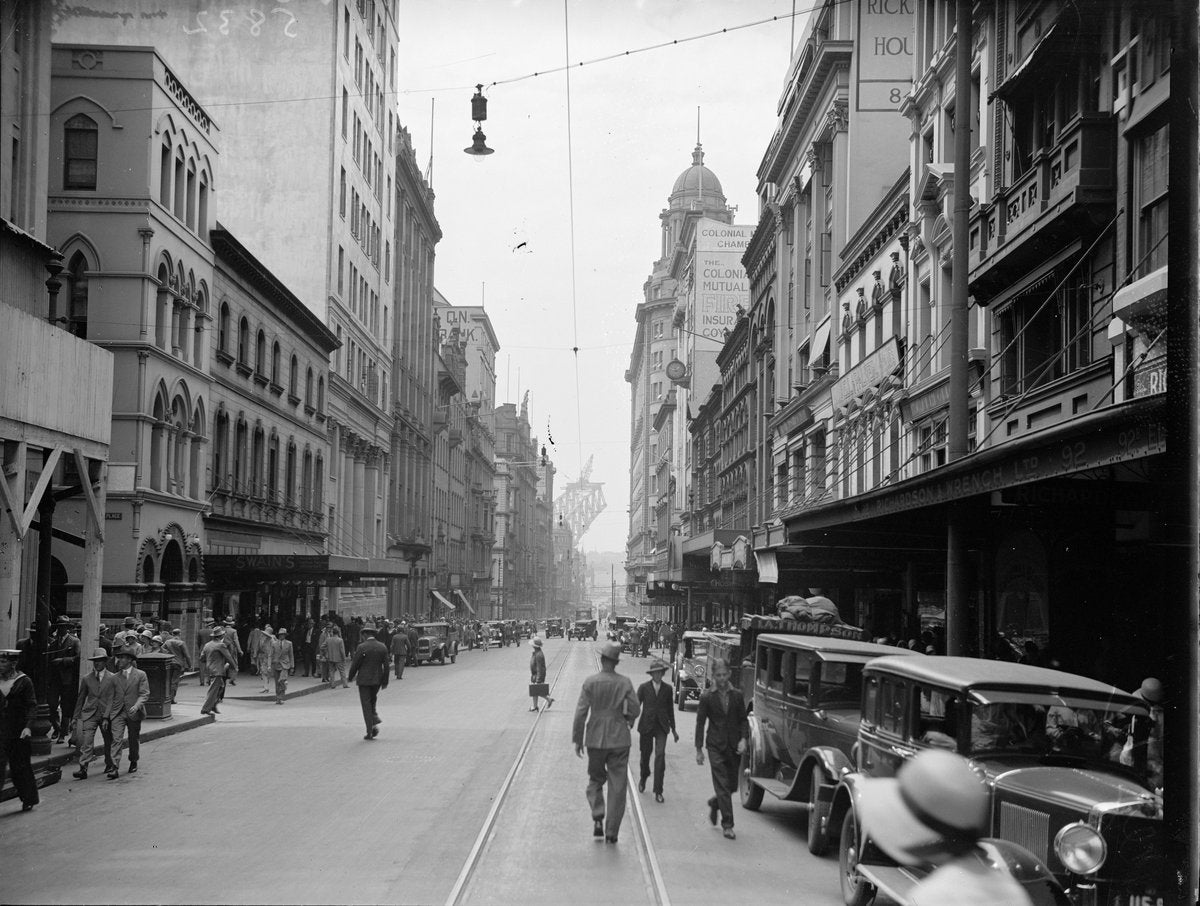 Pitt Street, Sydney, below the signboards of Rickard House — photograph, from Australian Business & Conference Travel House, circa 1928