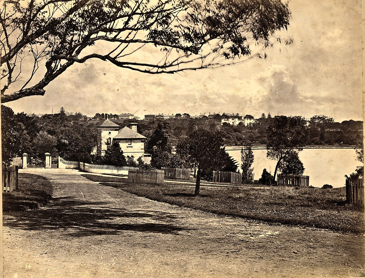 Victoria Lodge gatehouse and Farm Cove, Royal Botanic Garden, Sydney — photograph, from Royal Botanic Garden, circa 1865