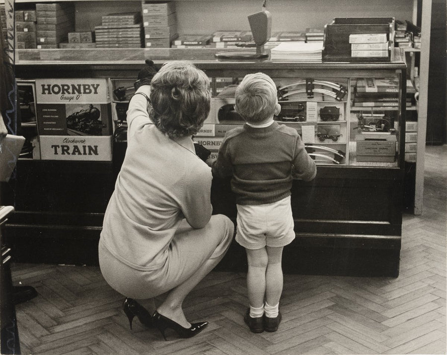 Choosing a Hornby clockwork train, Sydney, ca. 1967 — photograph, from Sydney, circa 1967