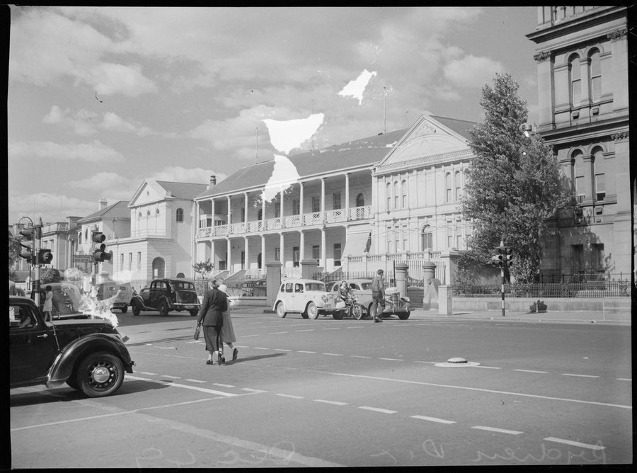 Parliament House, Macquarie Street, Sydney, with traffic at the intersection — photograph, from Parliament House, Macquarie Street, Sydney, circa 1949