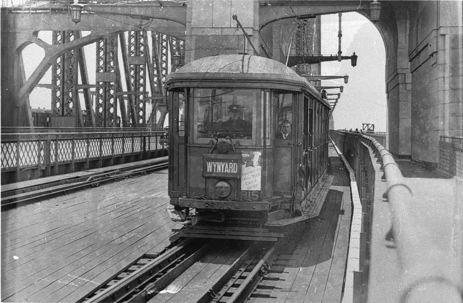 Wynyard-bound tram crossing the Sydney Harbour Bridge — photograph, from Fitzroy Street, circa 1930