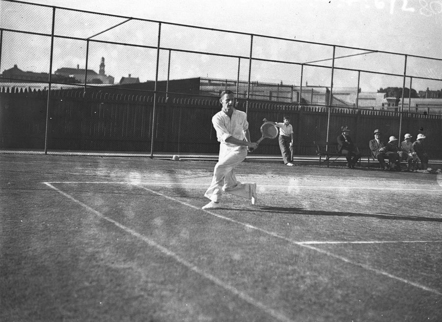 Tennis player mid-stroke on a Sydney court, 1934 — photograph, from Sydney, New South Wales, circa 1934