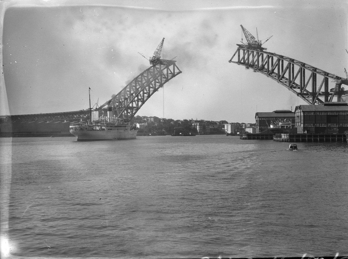 Sydney Harbour Bridge arch halves before joining, 1930 — photograph, from Olympic Drive, circa 1930