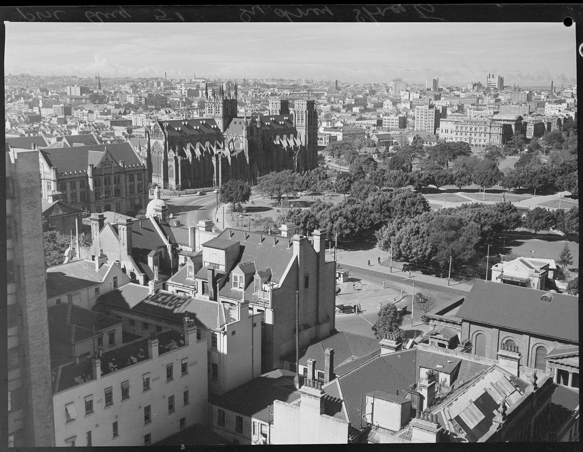 St Mary's Cathedral above Sydney rooftops, 1951 — photograph, from St Mary's Cathedral, Sydney, circa 1951
