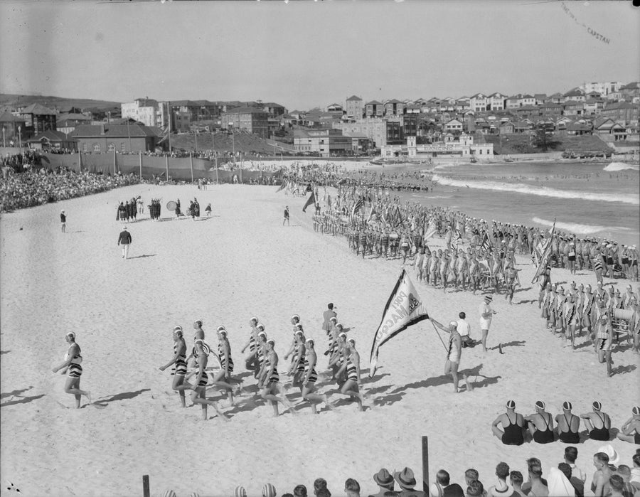 Surf life saving clubs marching past at the Bondi Beach surf carnival, 1938 — photograph, from Bondi Beach, circa 1938