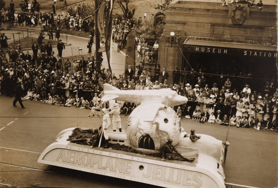 Aeroplane Jellies float passing Museum Station, 1938 — photograph, from Liverpool Street Cycleway, circa 1938