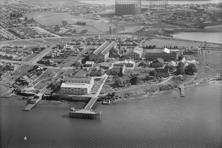Cabarita Point paint works and wharf from the air — photograph, from Cabarita Point, circa 1935