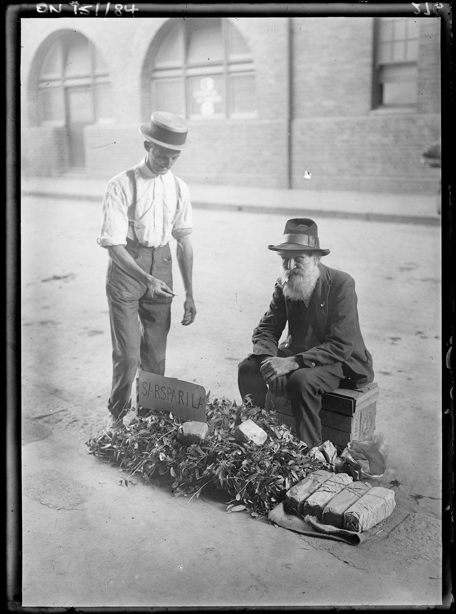Sarsaparilla seller at the City Markets, Haymarket — photograph, from City Markets, Hay Street, Haymarket, Sydney, circa 1913
