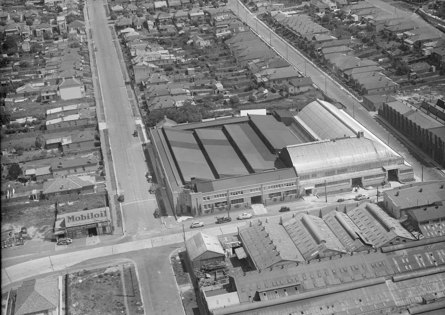 Factory complex among terraced streets, seen from the air — photograph, from Marrickville, circa 1940
