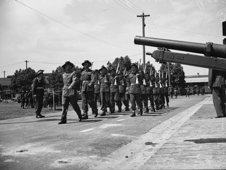 Army recruits marching past a field gun, Marrickville depot — photograph, from Marrickville, circa 1948