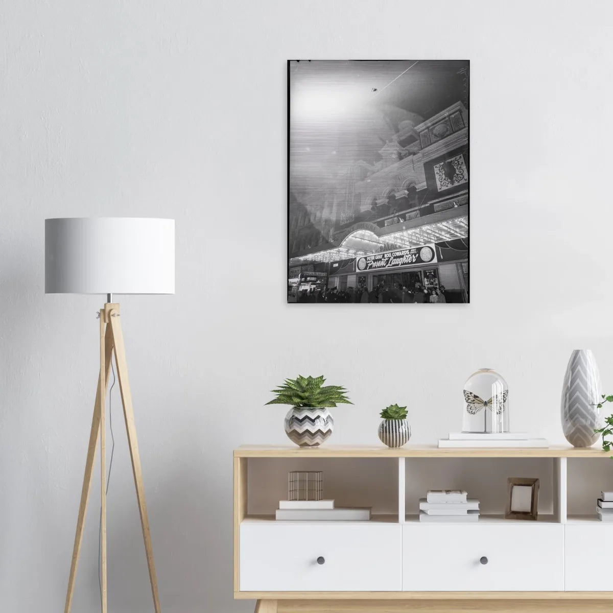 Aluminium print on a wall above a sofa