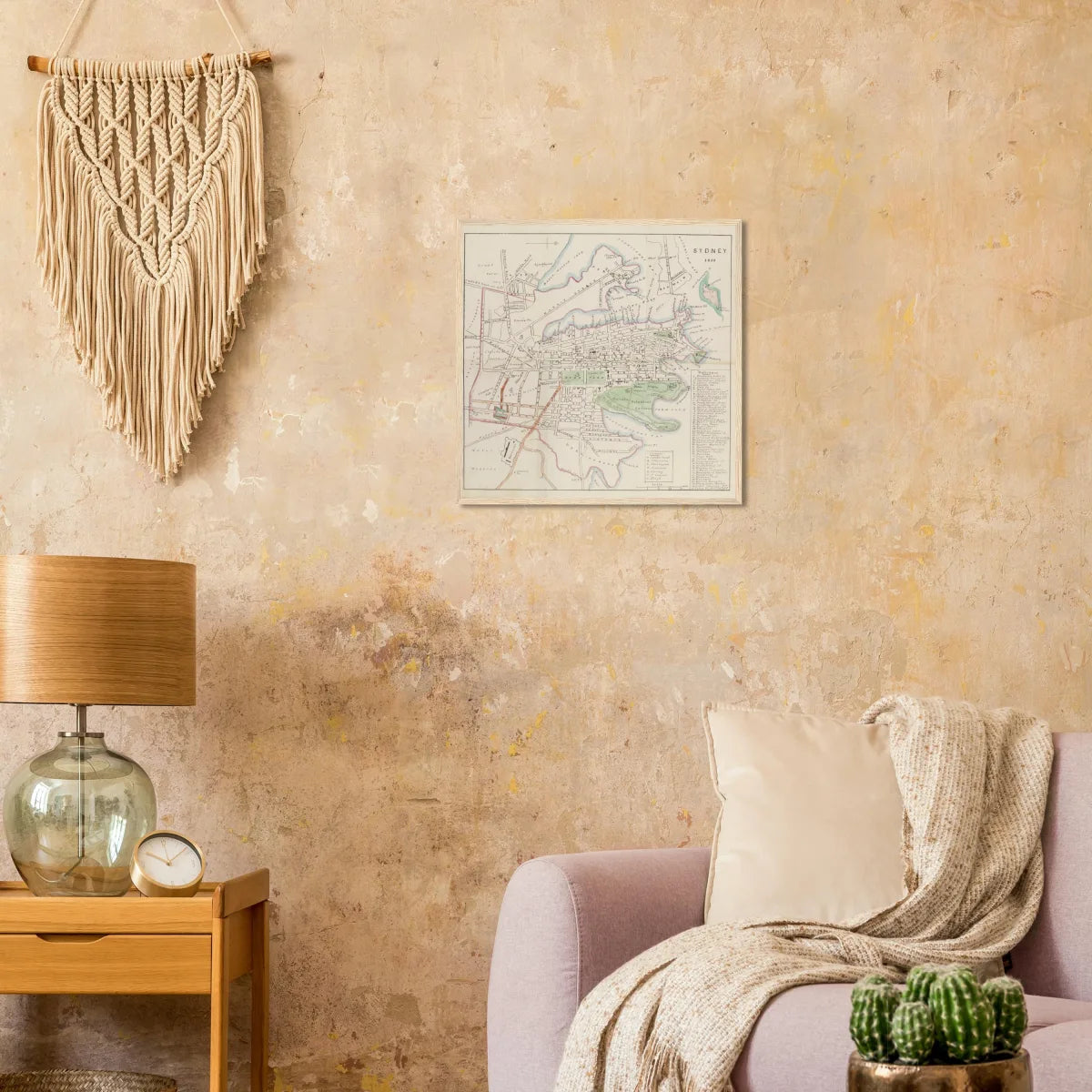 Pine-framed print on a wall in a warm living room