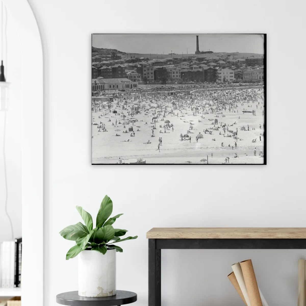 Matte print hung on a wall in a sunlit interior